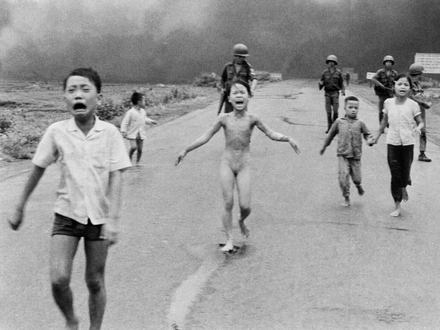 The famous Napalm Girl photograph which shows children fleeing down a road after a Napalm attack in Vietnam in the 1970s.